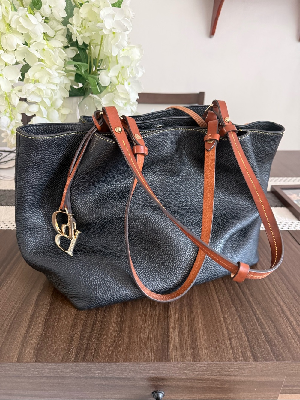 Dooney & Bourke Black Pebbled Leather Shoulder Bag with Brown Straps